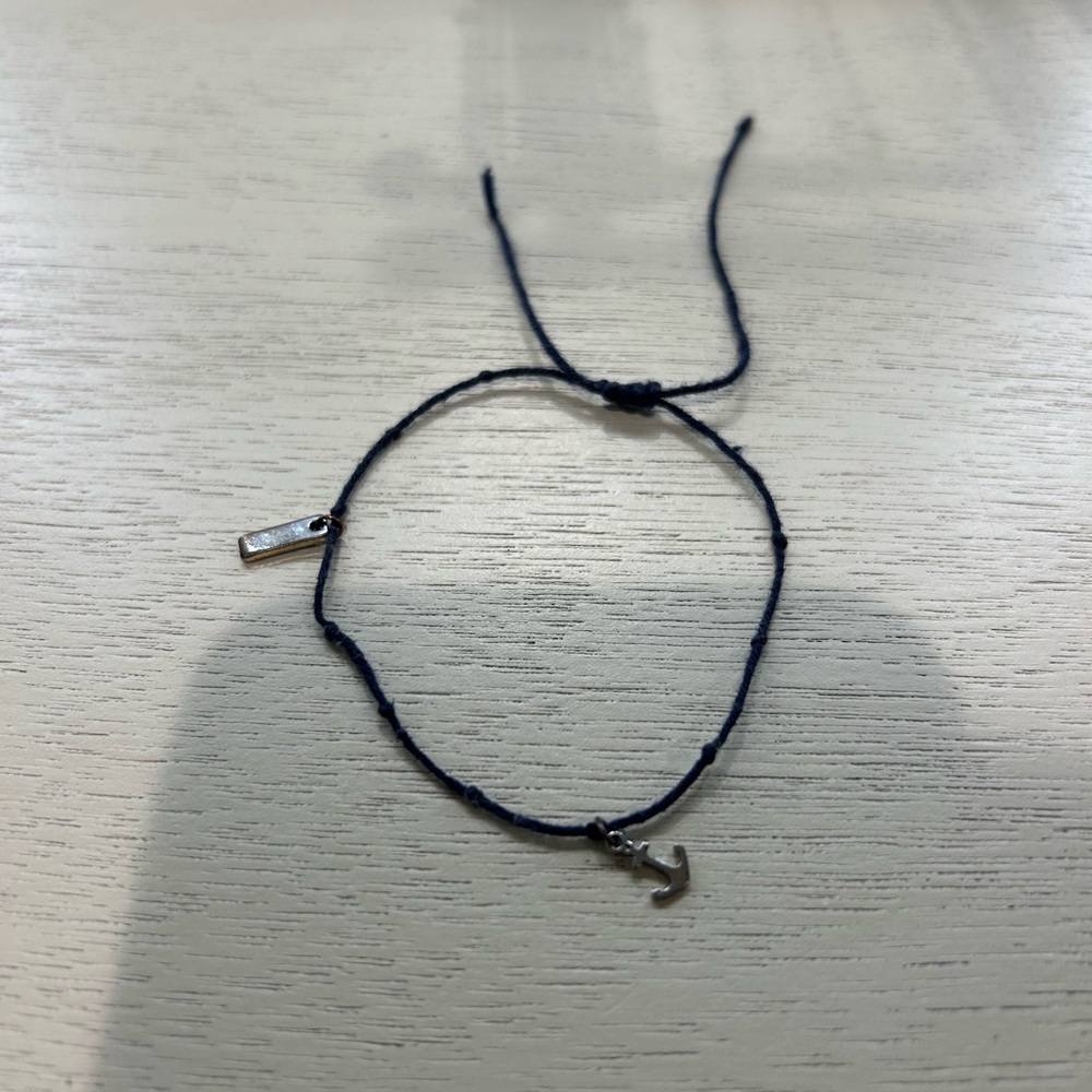 Black String Bracelet with Silver Charms